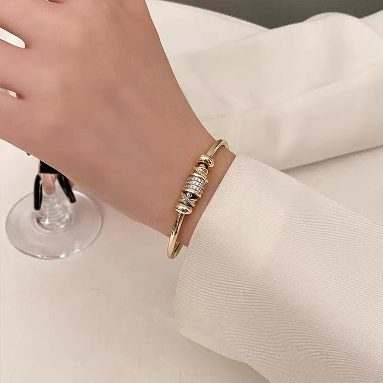 Journee - Adjustable Bracelet with Golden Charms